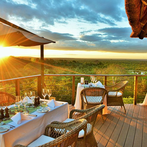 Sunset terrace dining at Victoria Falls Safari Club overlooking the bushveld